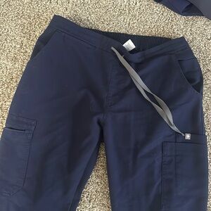 Figs size small, navy straight legged pants
